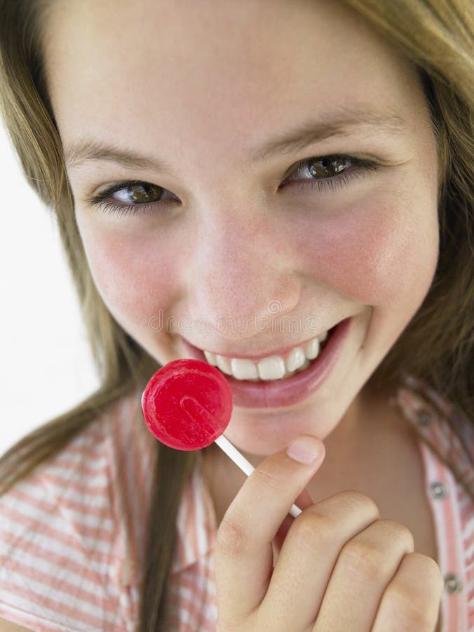 Teenage Girl Eating Lollipop