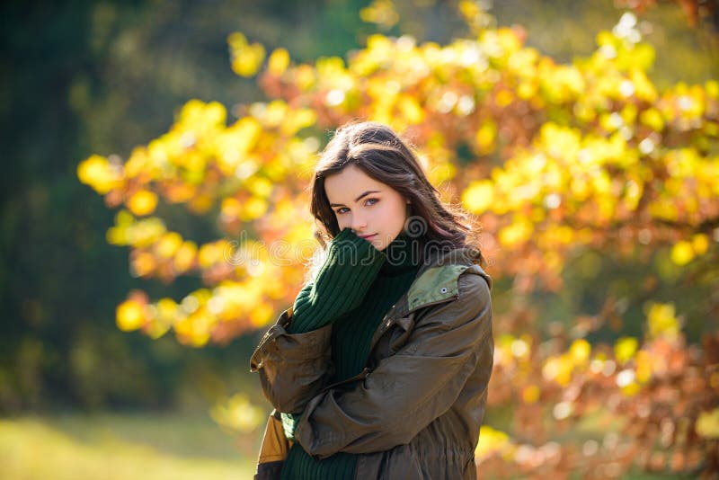 Teenage Girl Enjoying Autumn Weather on Yellow Foliage Background ...