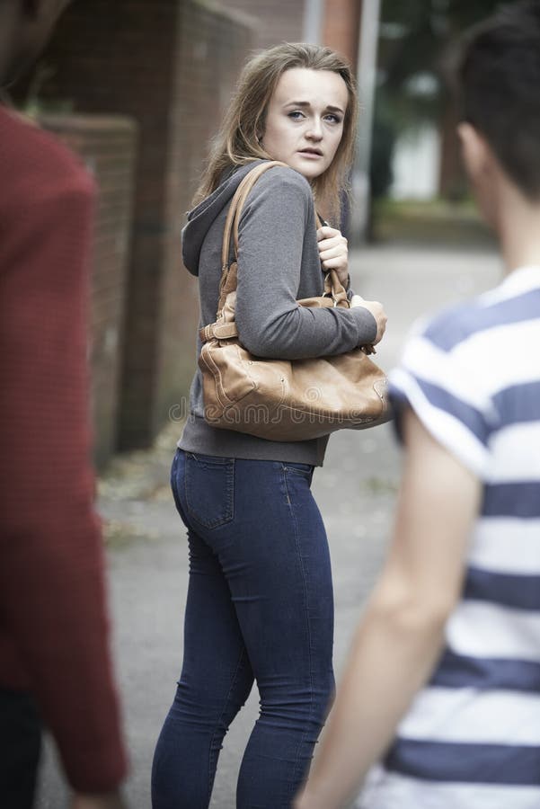 Teenage Girl Feeling Intimidated As She Walks Home