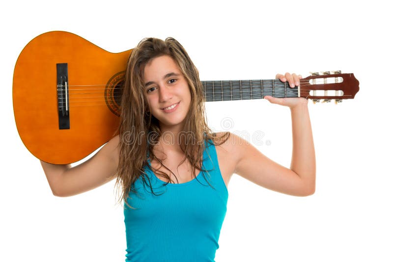 Teenage girl holding an acoustic guitar