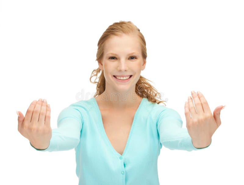 Teenage girl making inviting gesture stock images Teenage girl making inviting gesture stock images