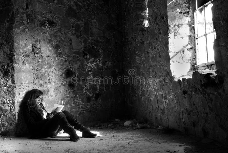 Teenage girl reading a book