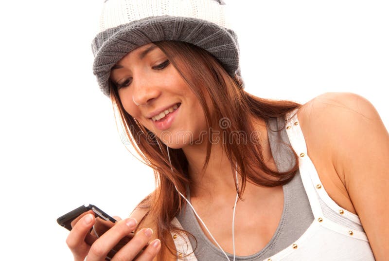 Teenage girl reading text message on cell phone