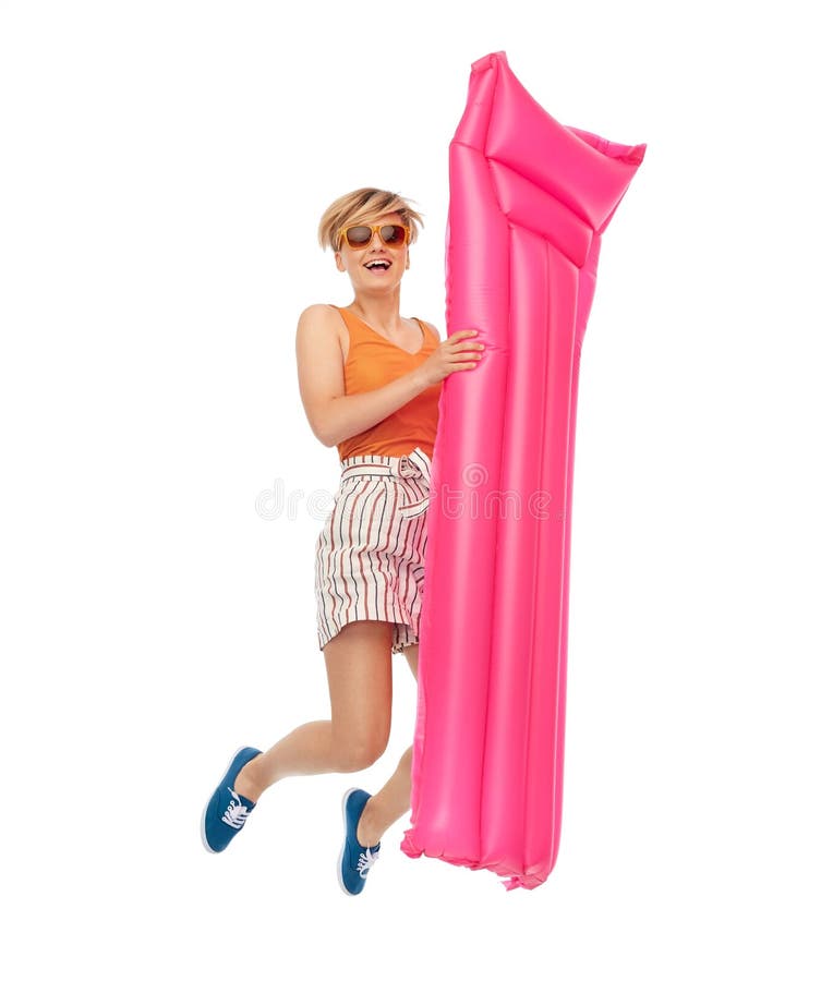 Teenage girl in shades jumping with pool mattress royalty free stock photos Teenage girl in shades jumping with pool mattress royalty free stock photos