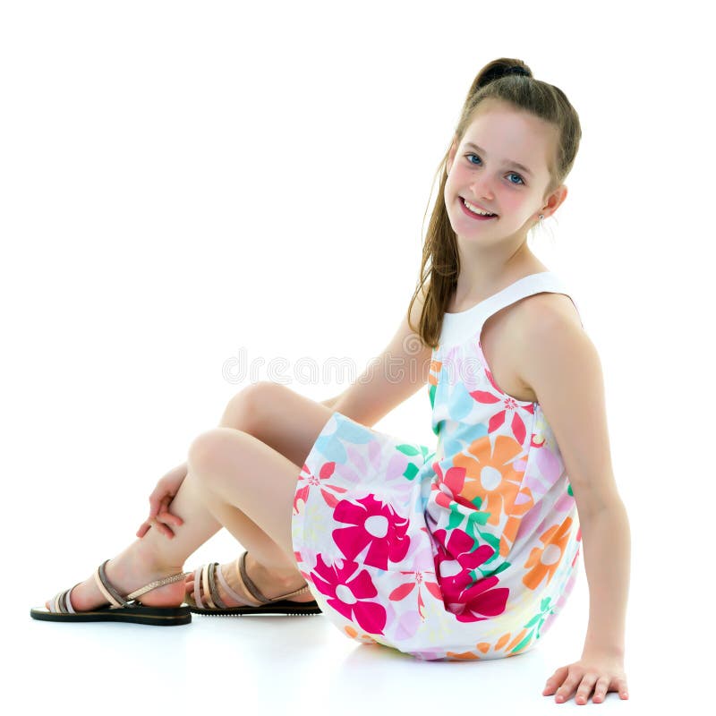 A Teenage Girl is Sitting on the Floor. Stock Photo - Image of ...