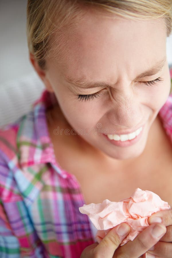 Teenage Girl Sneezing Into Tissue Stock Photography Im