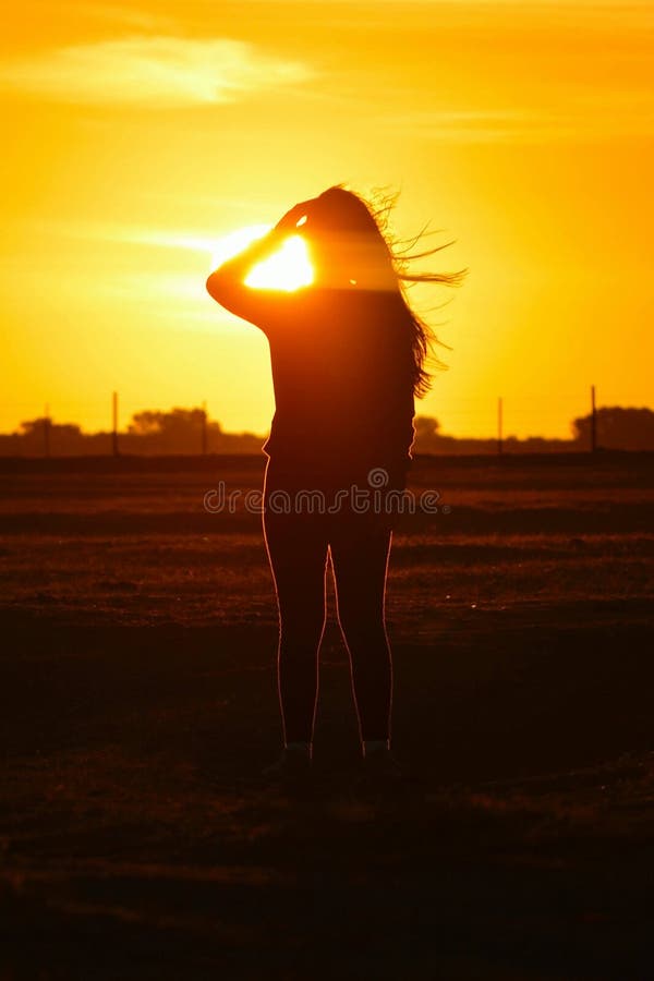 Teenage Girl and the Sunset Stock Photo ...