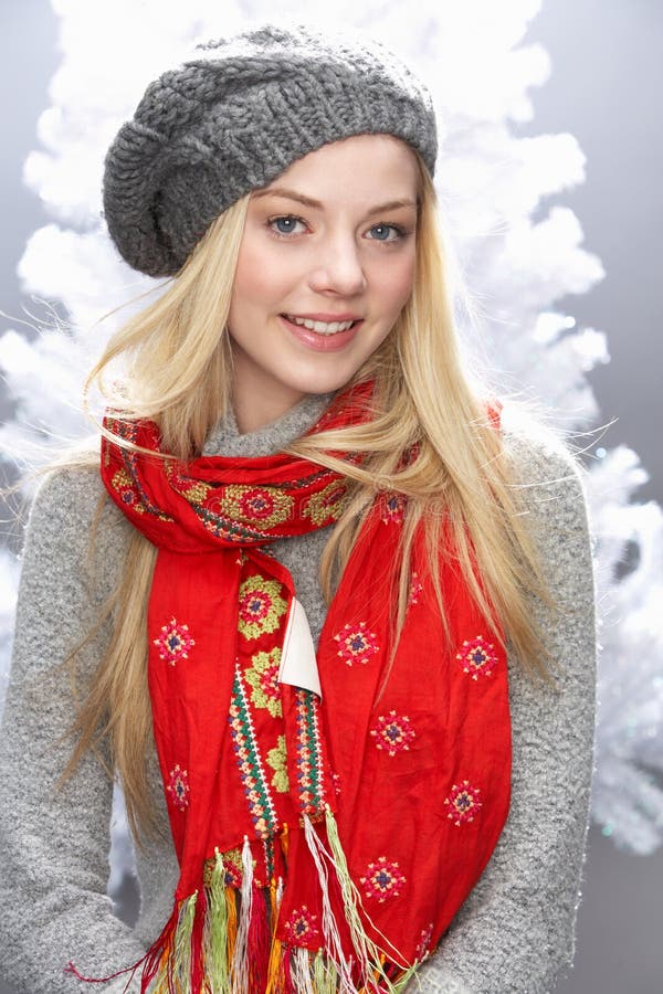 Teenage Girl Wearing Knitwear In Studio