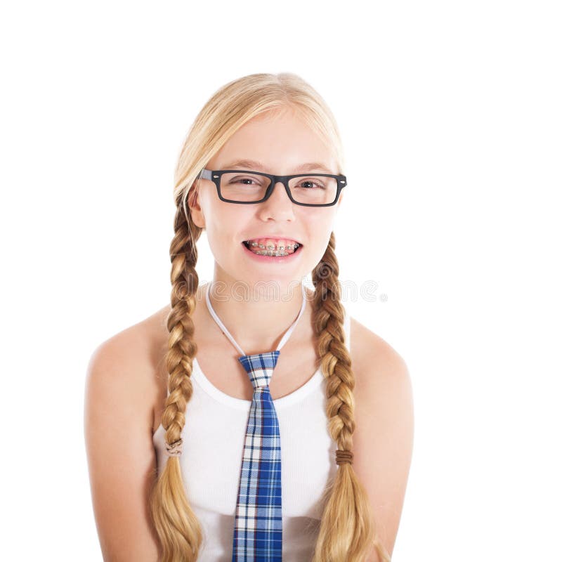 Teenage girl wearing a school uniform and glasses. Smiling face, braces on your teeth.