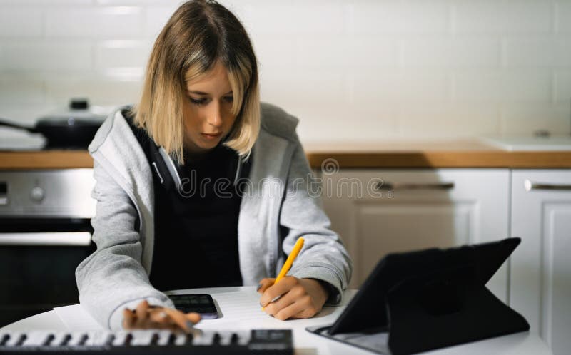 Teenage girl composing music