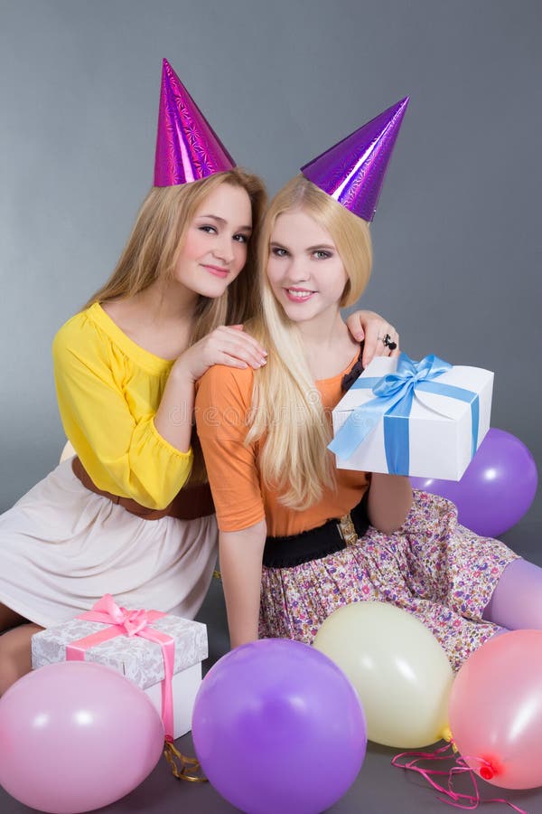 Teenage Girls With Ts And Balloons At A Birthday Party