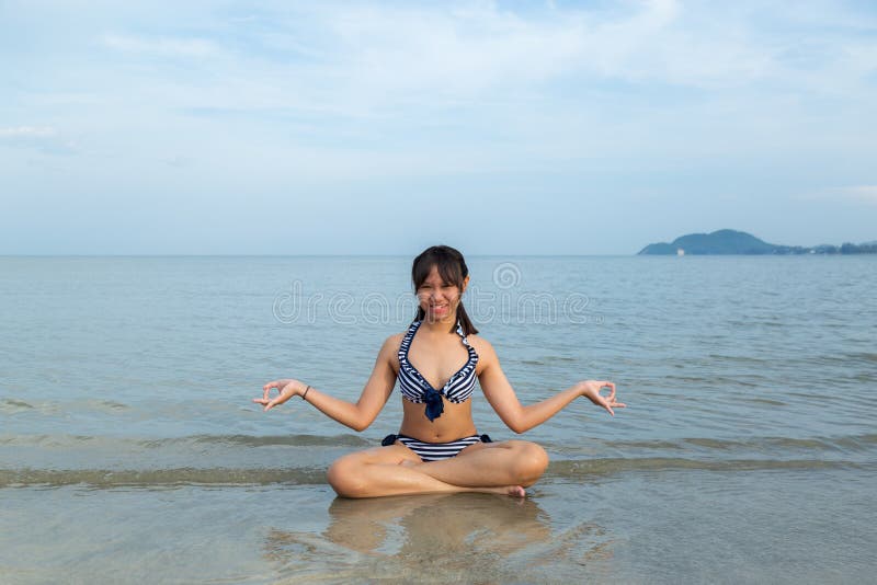 Young Teens In Bikinis At Beach