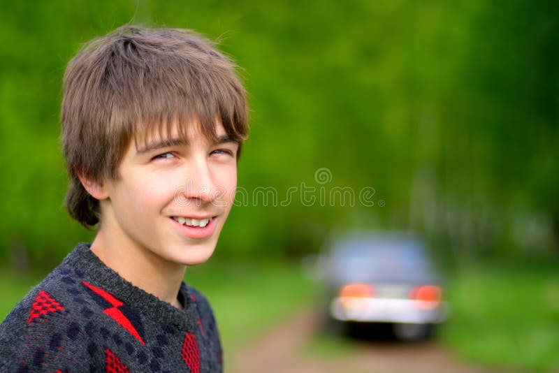 Teenager and car royalty free stock image