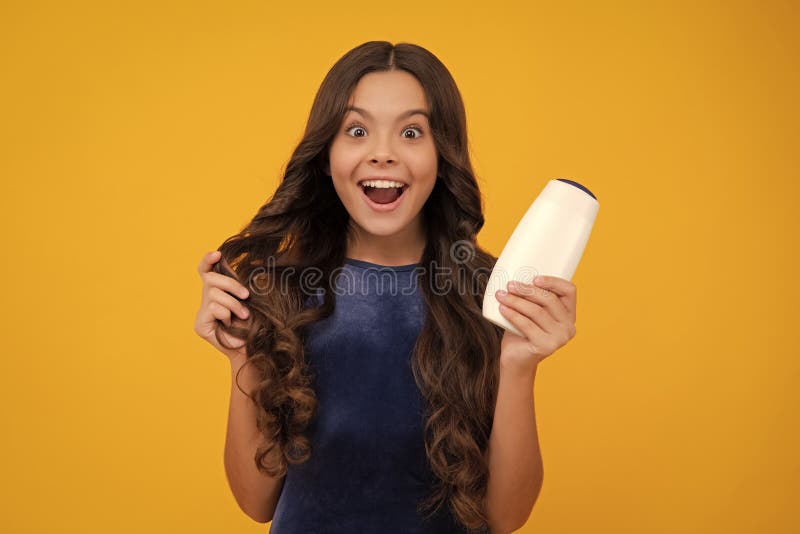Teenager Child Girl with Bottle Shampoo Conditioners or Shower Gel