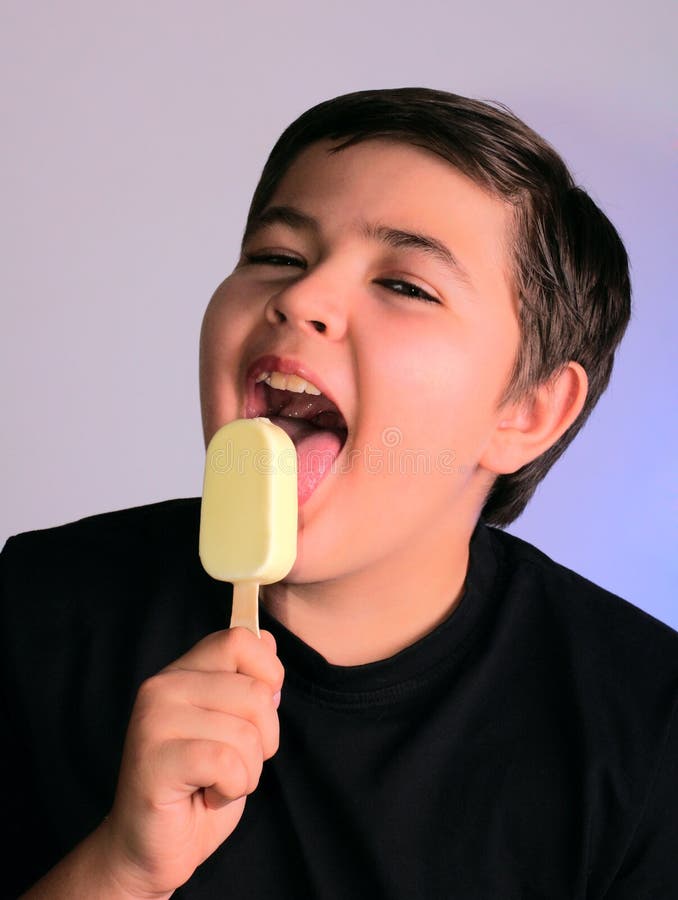 Teenager eats tasty ice-cream