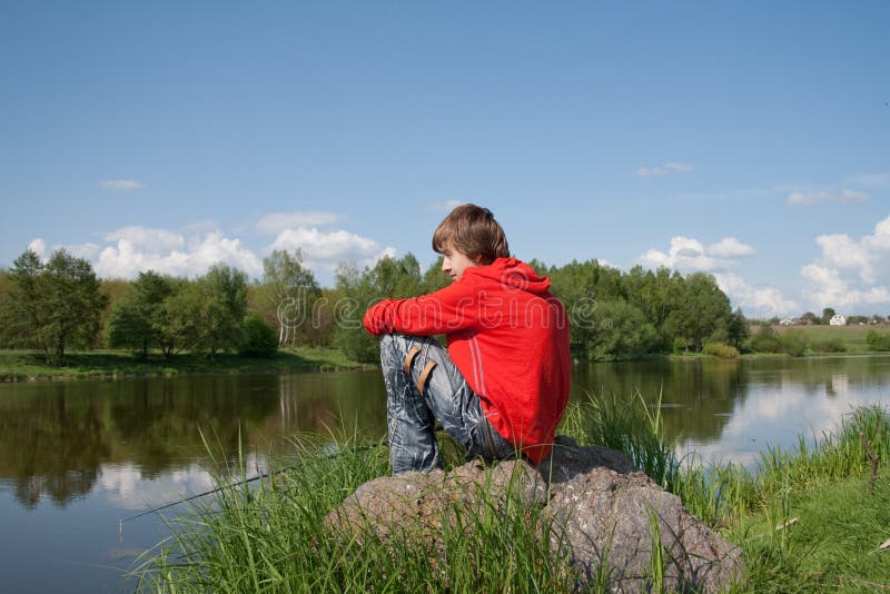 teenager fishes