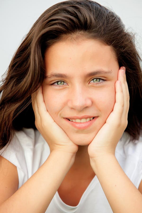 Teenager girl with blue eyes smiling