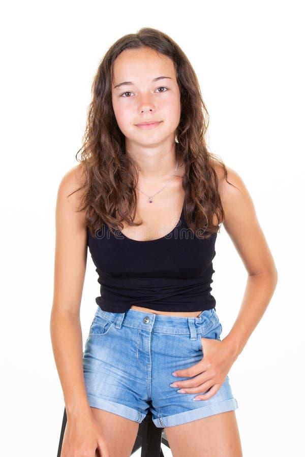 Teenager Girl Over White Wall Posing With Hand At
