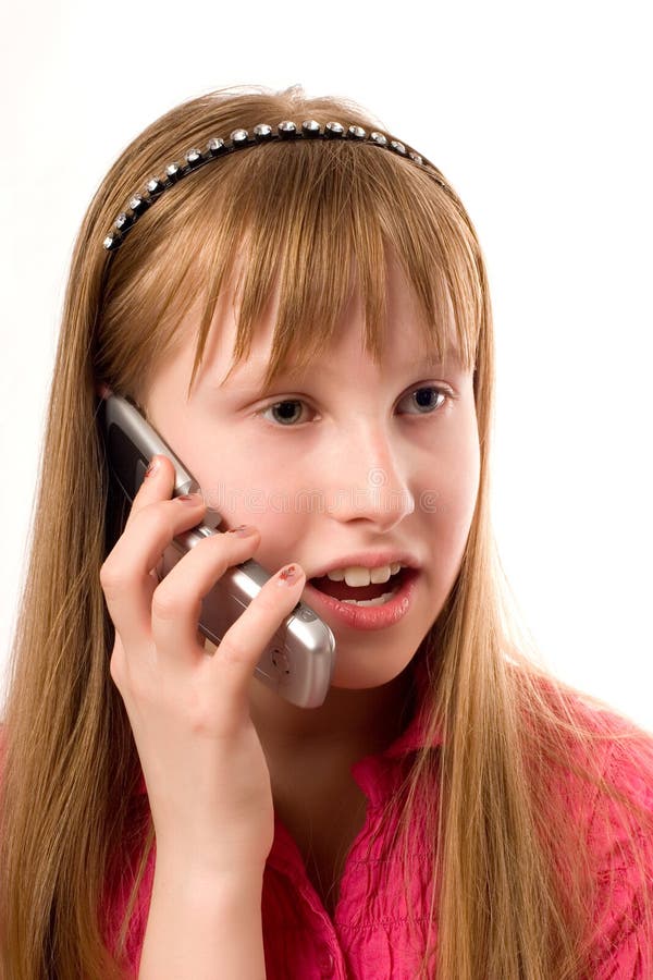 Teenager girl talking by mobile phone isolated on