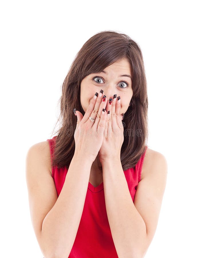 Teenager with hands over mouth stock image