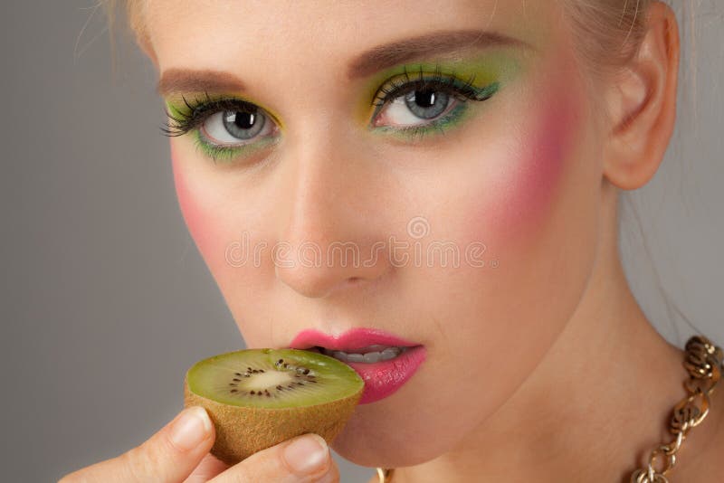 Teenager With Kiwi and Matching Makeup