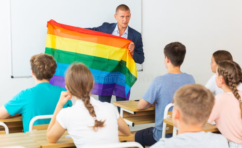 Teenager students listening lecture about LGBT community