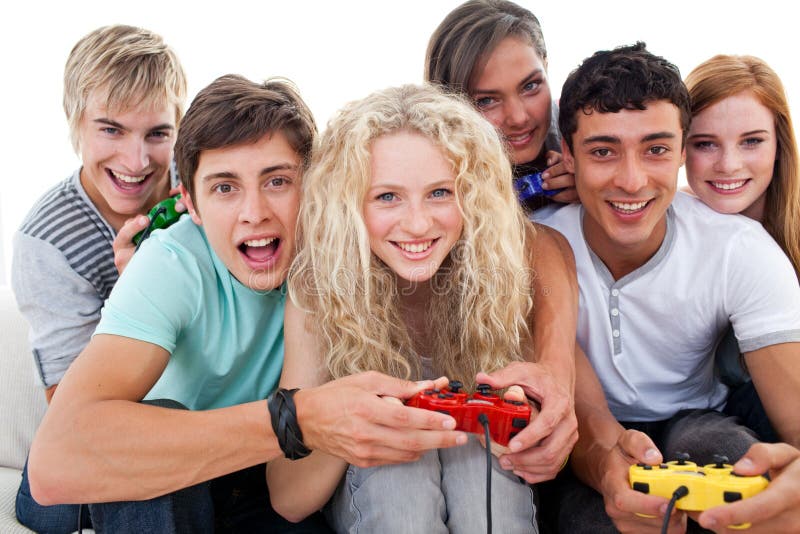 Teenagers having fun playing video games royalty free stock images