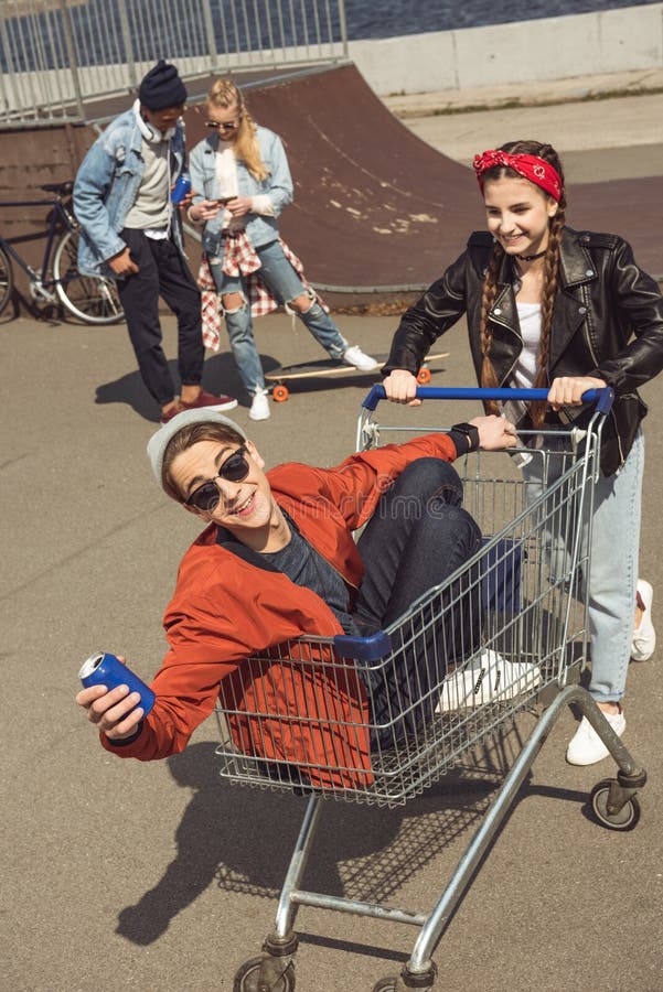 Teenagers Having Fun with Shopping Cart in Skateboard Park Stock Photo ...