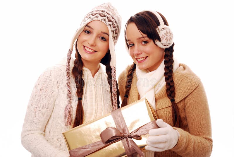 Teenagers holding christmas gift