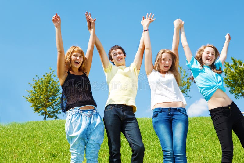 Teenagers holding hands royalty free stock photography