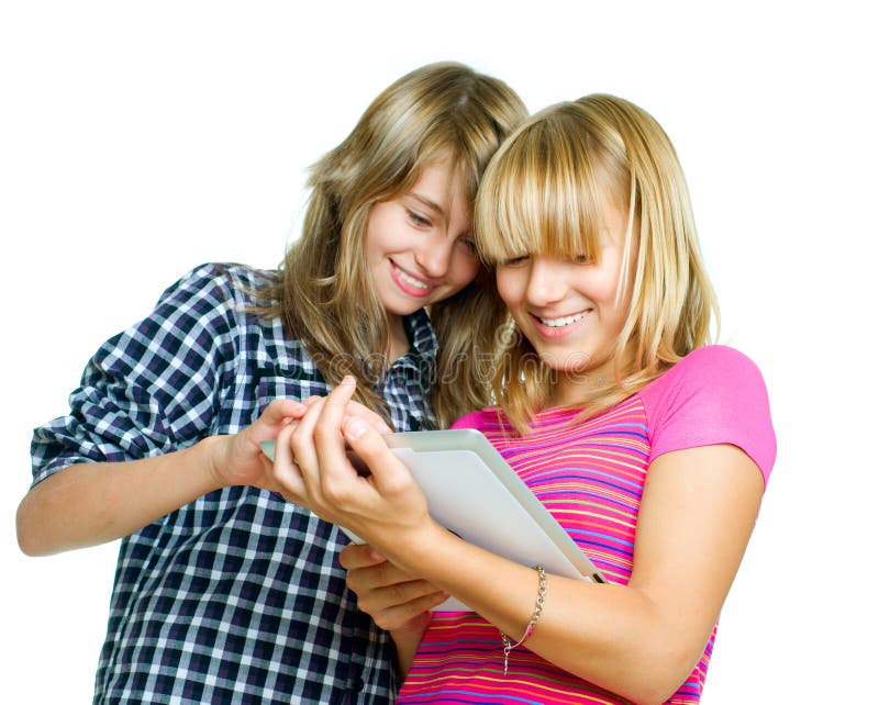 Teenagers using tablet PC stock image
