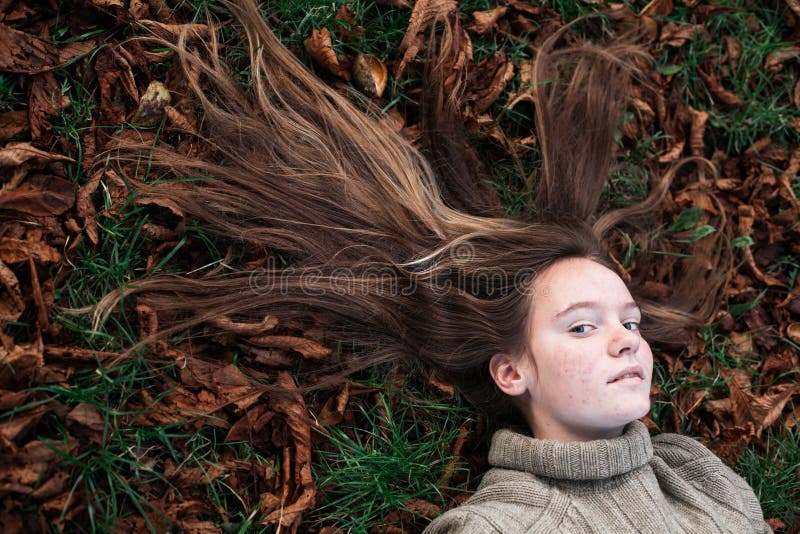 Teengirl Laying on Autumn Ground - Long Hair Scattered on Grass. Stock Photo - Image of fall, foliage: 192731880 Teengirl Laying on Autumn Ground - Long Hair Scattered on Grass. Stock Photo - Image of fall, foliage: 192731880