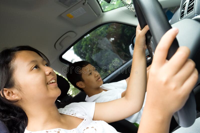 Teens enjoy driving a car royalty free stock images Teens enjoy driving a car royalty free stock images