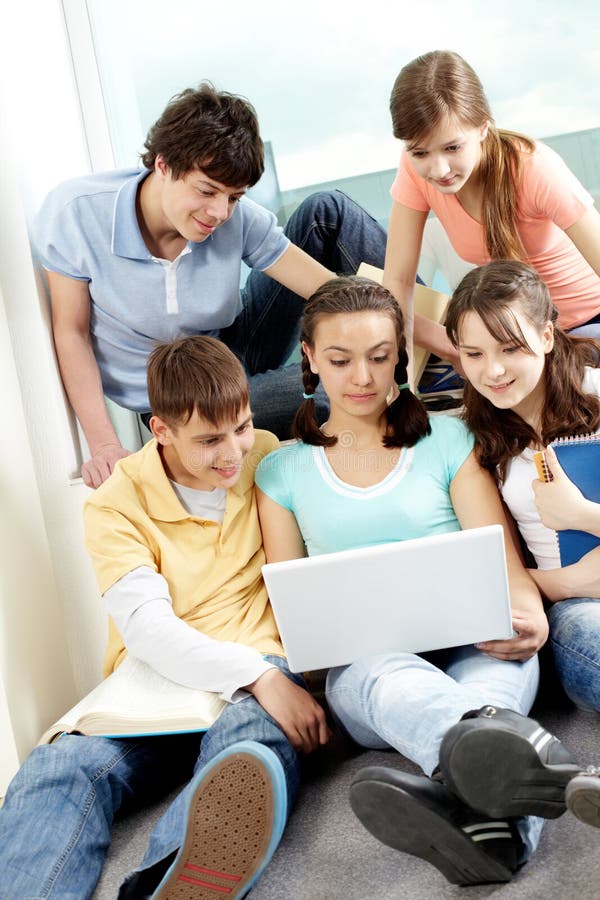 Teens with laptop royalty free stock images