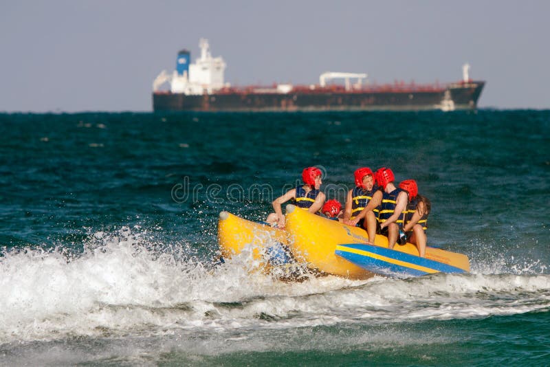 Teens Ride on Banana Boat in Florida Editorial Photo Image of teens