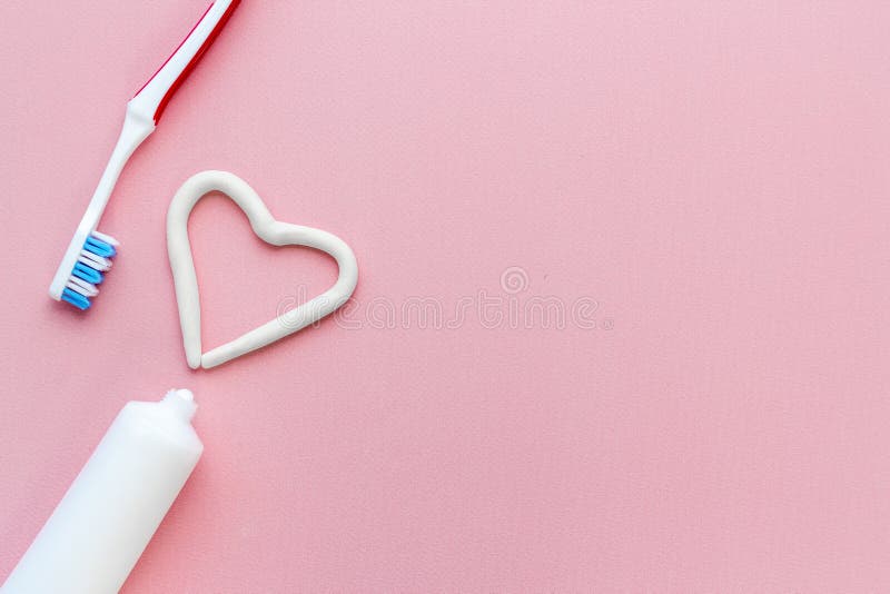Teeth Hygiene. Toothbrush with Heart Shape Made of Toothpaste, Top View