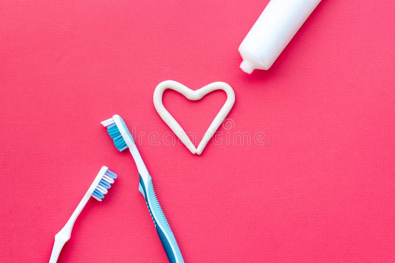 Teeth Hygiene. Toothbrush with Heart Shape Made of Toothpaste, Top View