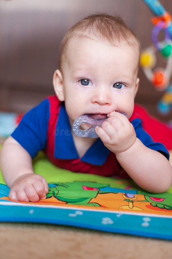 Teether for Teeth in Baby`s Hands, Teether Toy Stock Image Image of