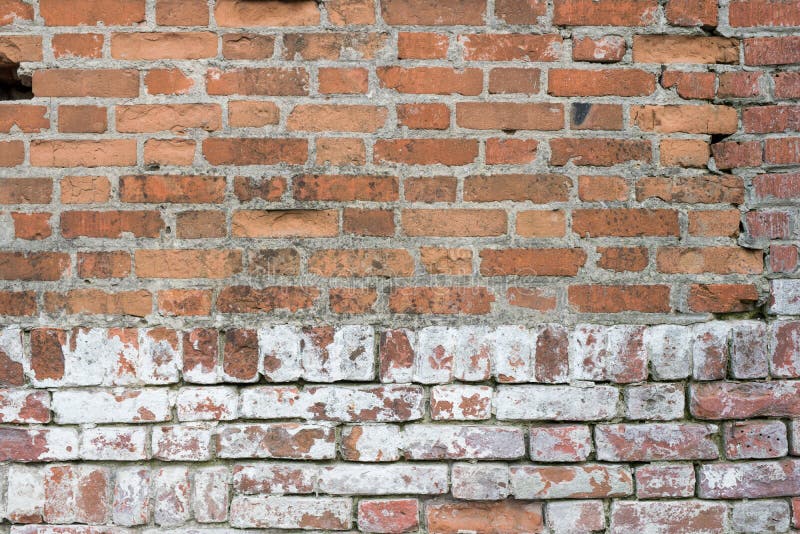 Tegelstenvägg, gammal textur av röda stenkvarter Bakgrund arkivfoto Tegelstenvägg, gammal textur av röda stenkvarter Bakgrund arkivfoto