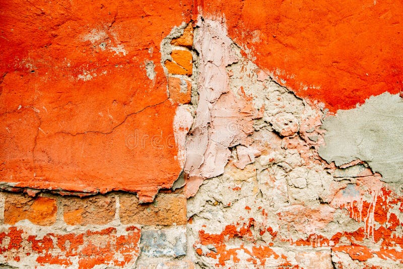 Brick wall in stucco crumbling orange texture background. Brick wall in stucco crumbling orange texture background