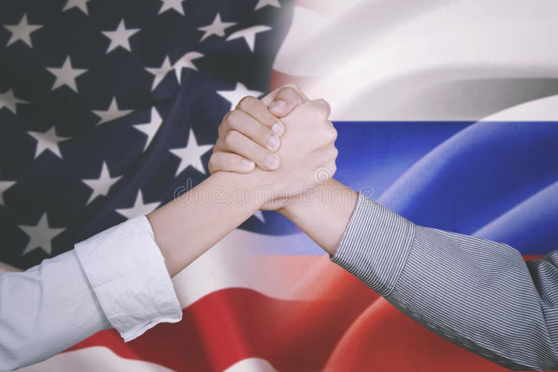 Teilhaber mit Amerika- und Niederlande-Flagge lizenzfreie stockbilder