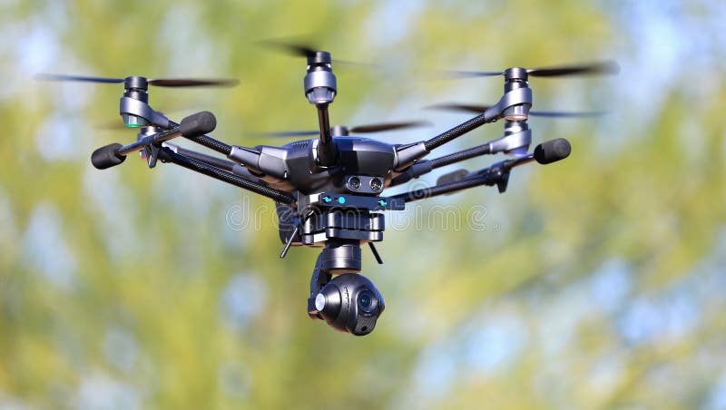 Tekniskt avancerat kamerasurr Hexacopter i flykten arkivbilder