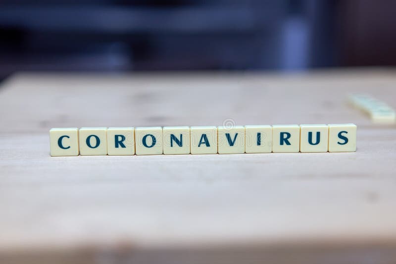 Tekst CORONAVIRUS met schrabbelletters stock afbeelding Tekst CORONAVIRUS met schrabbelletters stock afbeelding