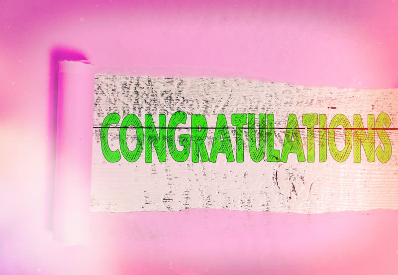 Text sign showing Congratulations. Business photo showcasing a congratulatory expression usually used in plural form Rolled ripped torn cardboard placed above a wooden classic table backdrop. Text sign showing Congratulations. Business photo showcasing a congratulatory expression usually used in plural form Rolled ripped torn cardboard placed above a wooden classic table backdrop