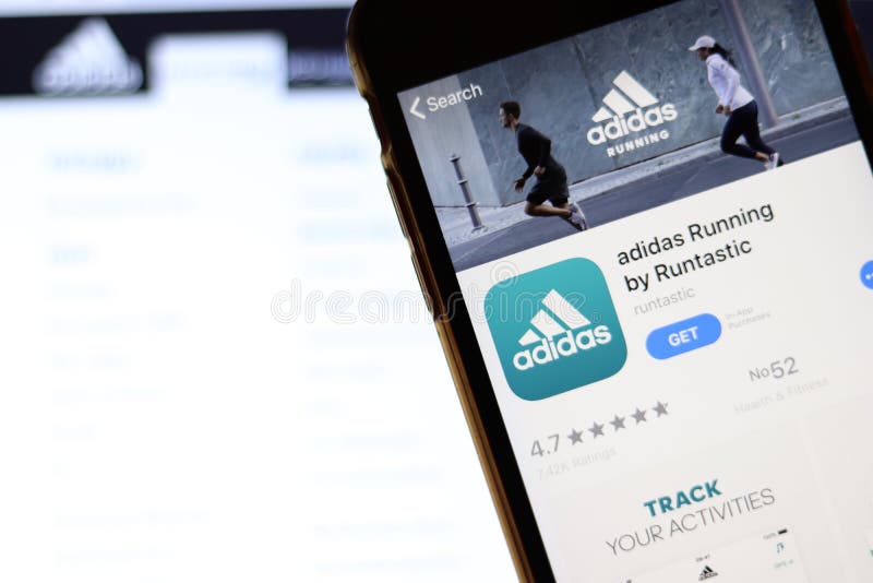 Teléfono Móvil Con Icono De Adidas En En La Pantalla De Cierre Con Página Web En Portátil Fondo Borroso Con Adidas Runt Fotografía editorial - Imagen de teléfono, editorial: 163877722