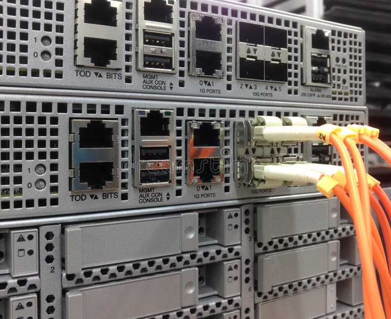 Telecommunication Ethernet Cables Connected to Internet Switch. stock photography