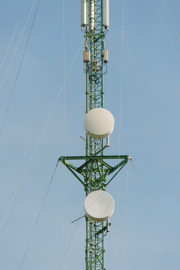 Mast with Blue Sky,Cell Tower and Radio Antenna Stock
