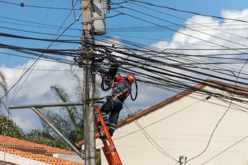 and Power Cables, Technician Working on Street