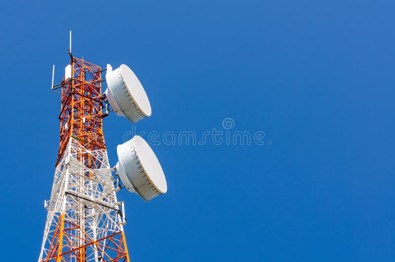 Telecommunication tower on blue sky background