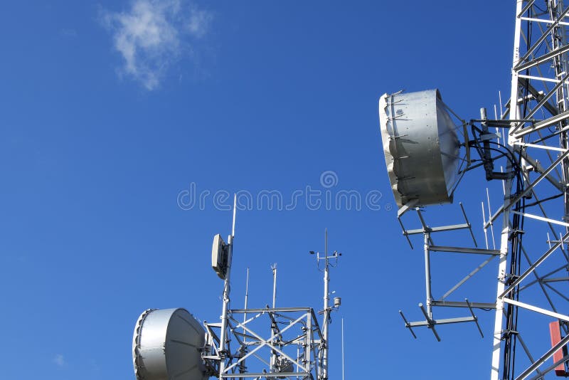 Telecommunication Towers on Blue Sky